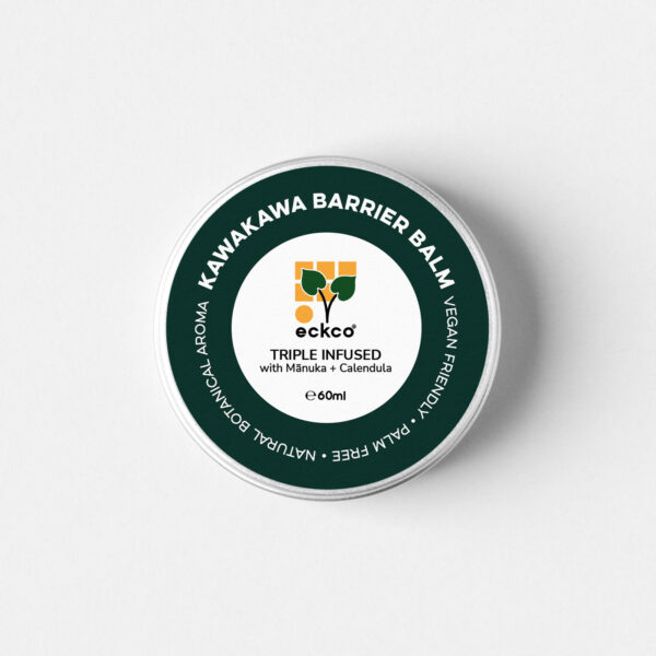 A top-down view of a round silver tin of eckco brand Kawakawa Barrier Balm. The lid has a dark green outer ring with white text reading 'KAWAKAWA BARRIER BALM', 'VEGAN FRIENDLY', 'PALM FREE', and 'NATURAL BOTANICAL AROMA', with 'e 60ml' at the bottom. The white centre of the label features the eckco logo and the text 'TRIPLE INFUSED with Mānuka + Calendula